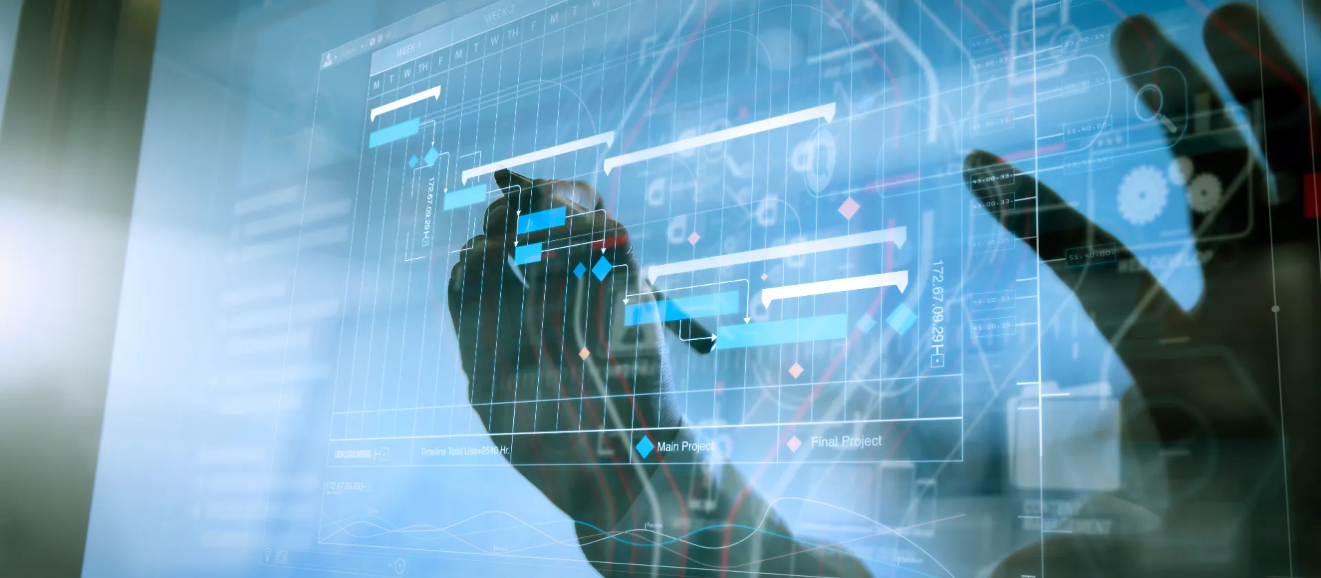 Hand drawing digital project plans and timelines on a transparent interface, representing professional program and project management, IT management and the Project Management Factory.